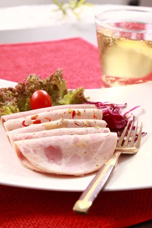 Ham, vegetables and beverages. の写真素材