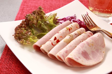 Ham, vegetables and beverages. の写真素材