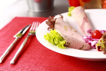 Ham, vegetables and beverages. の写真素材