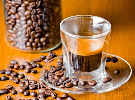 espresso coffee shot with coffee beans.の写真素材