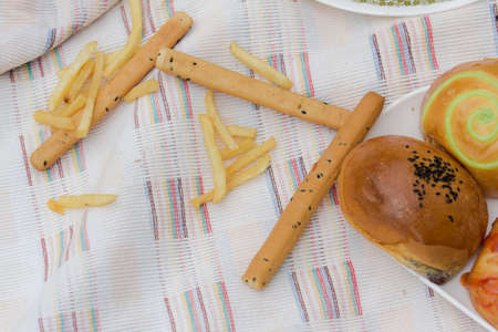 Breakfast-Bacon and fried egg on white dishの写真素材