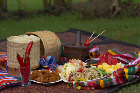 Thai papaya salad serve with vegetables の写真素材