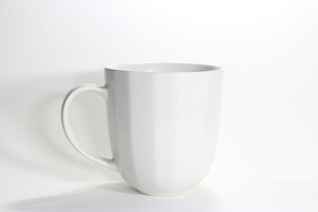 White cup isolated on white backgroundの写真素材