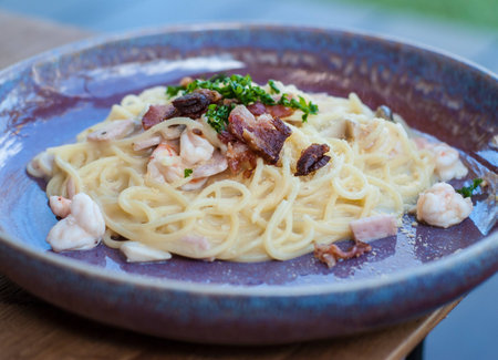 spaghetti carbonara on dishの写真素材