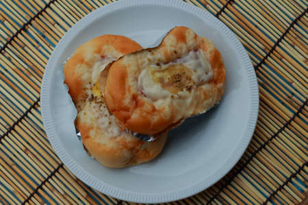 Bread, ham, cheese, and white palette の写真素材