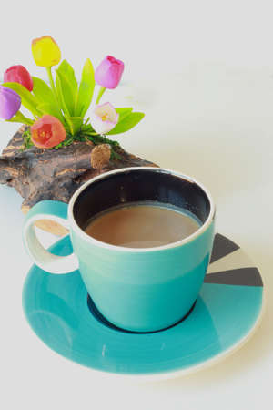 Hot coffee with flowers の写真素材