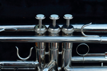 Silver trumpet in the black box の写真素材