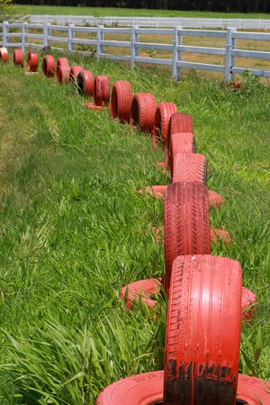Spare tire on a green grass.の写真素材