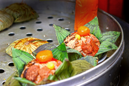 Steamed rice wrapped in lotus leaf.の写真素材