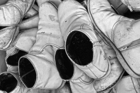 Old shoes leave together の写真素材