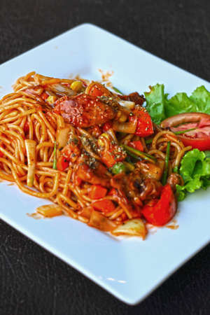 Spaghetti with sauce in the plate.の写真素材