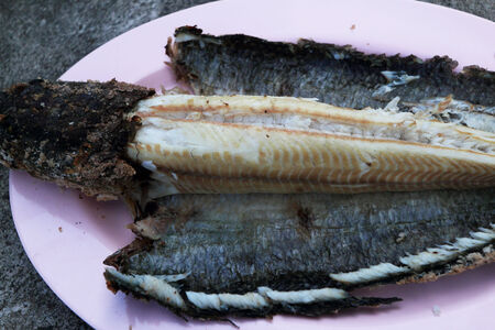 Grill snake head fish with salt coated