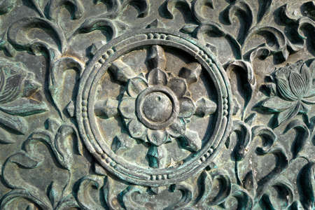 Surface of Style Bronze wall of the temple in Korea の写真素材