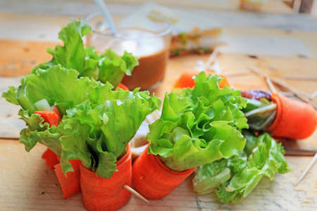 Salad vegetables - carrots, rolls to crabの写真素材