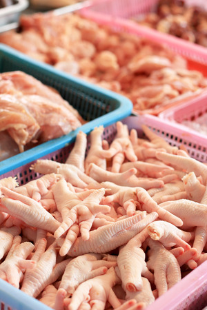 Fresh chicken feet marketの写真素材