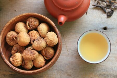 dried fig and hot teaの写真素材