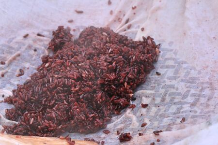 Steamed black rice at marketの写真素材
