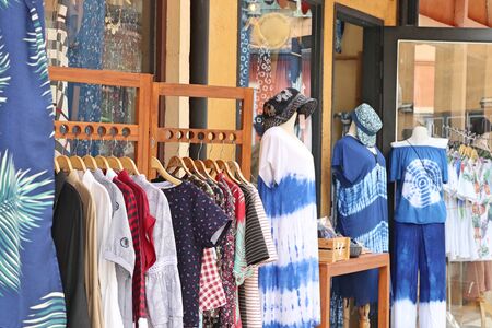 Shop clothes on hangersの写真素材