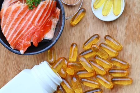 fish oil capsules with freshの写真素材
