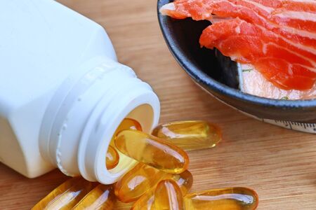 fish oil capsules with freshの写真素材