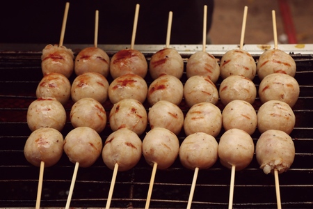 Grilled sausages at the marketの写真素材