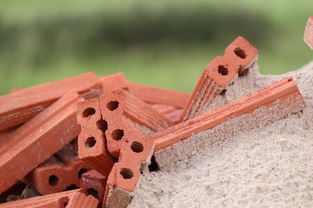 brick in the pile of sandの写真素材