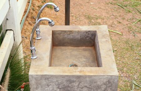 Faucetc and cement sinksの写真素材