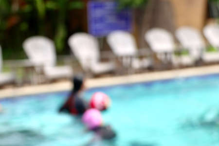blurred kid swimming poolの写真素材