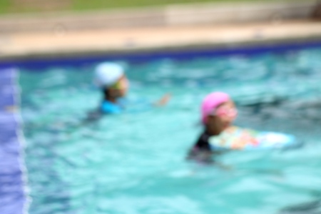 blurred kid swimming poolの写真素材