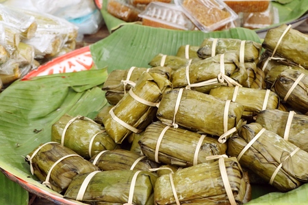 Sticky rice wrapped in banana leavesの写真素材