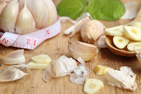 garlic on wooden backgroundの写真素材