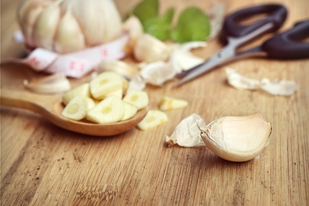 garlic on wooden backgroundの写真素材