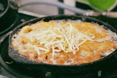 Crispy fried mussels with eggの写真素材