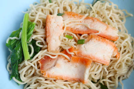 noodles bowl with red porkの写真素材