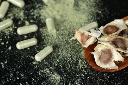 Moringa capsules with dried seedの写真素材