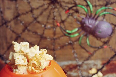 halloween popcorn with artificial spiderの写真素材
