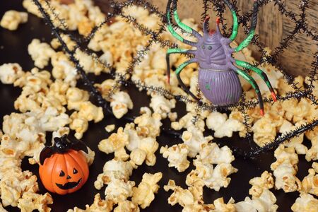 halloween popcorn with artificial spiderの写真素材