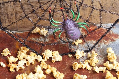 halloween popcorn with artificial spiderの写真素材