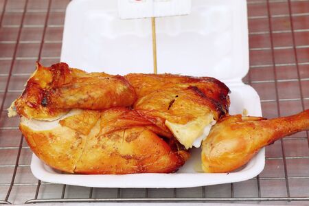 Grilled chicken at the marketの写真素材