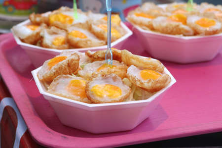 Quail eggs at street foodの写真素材