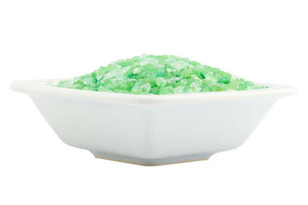 green bath salt for spa in bowl isolated on whiteの写真素材