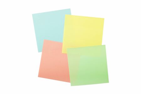 four colored sticky notes isolated on white backgroundの写真素材