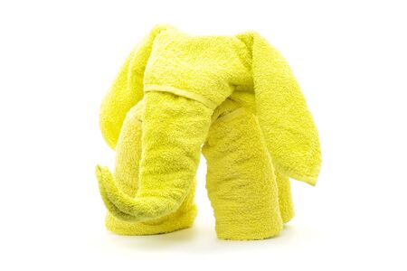 yellow elephant  towel origami folding  isolated on whiteの写真素材