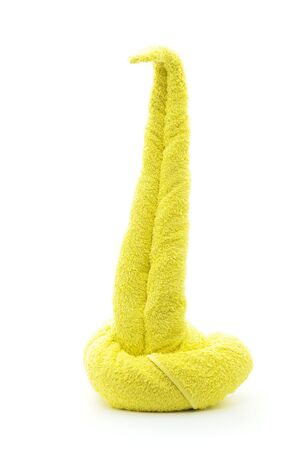 yellow snake  towel origami folding  isolated on whiteの写真素材