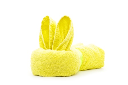 yellow rabbit  towel origami folding  isolated on whiteの写真素材
