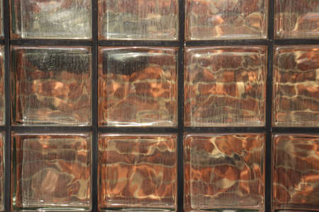 abstract background of brown glass wall with reflection in the glass.