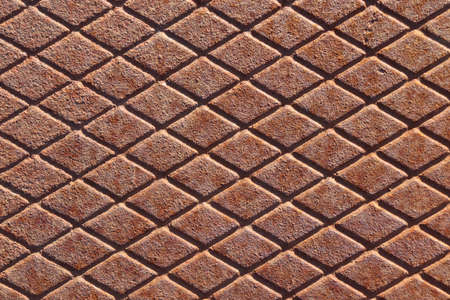 Rusty metal background with rhombus pattern. Grunge rusty metal texture.の写真素材