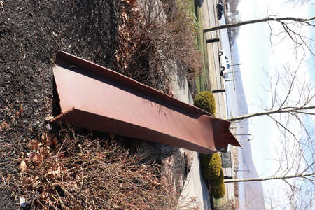 A closeup shot of a road sign on the side of a roadの写真素材