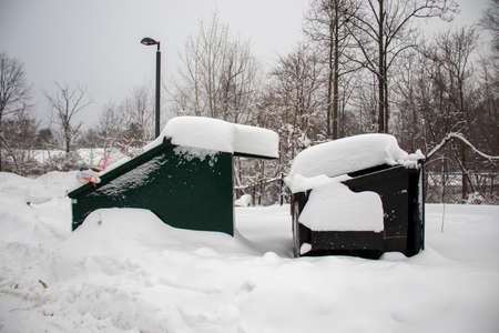 Abandoned playground covered with snow after a blizzardの写真素材