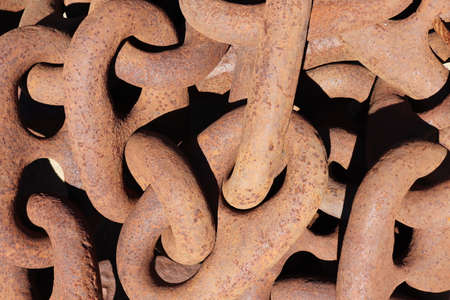 Rusty iron chain as background, closeup. Rusted steelの写真素材